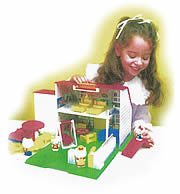 girl playing with Hello Kitty Dollhouse